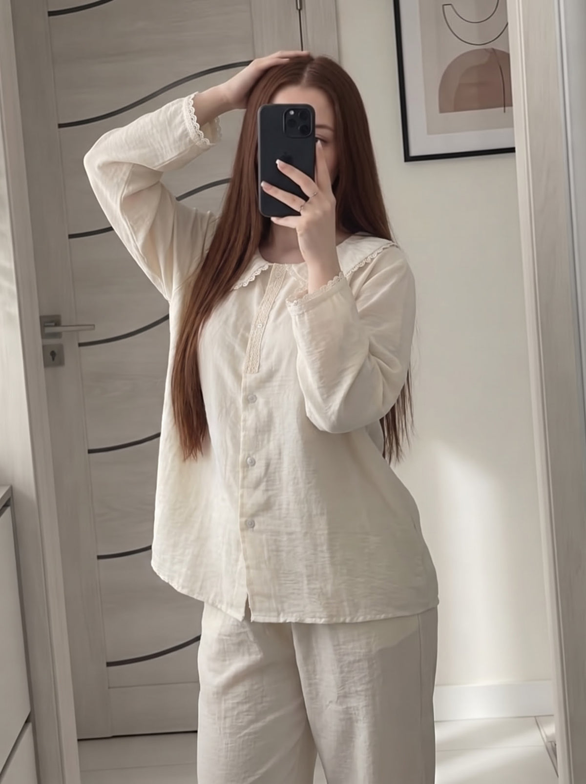 Woman wearing the White Lace Trim Linen Pajama Set by Morning Lace