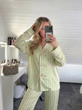 Woman wearing the Lime Striped Silky Pajama Set by Morning Lace
