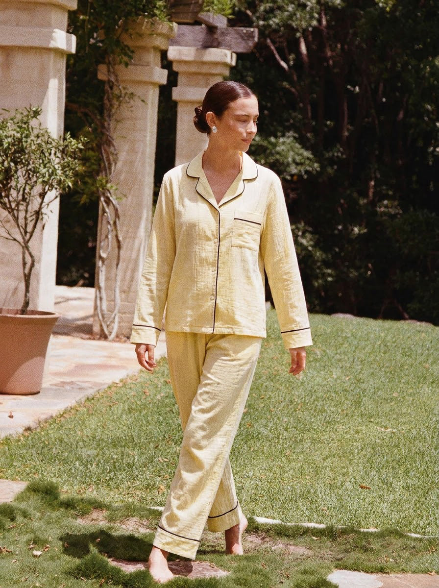 Woman wearing the Butter Yellow Piped Linen Pajama Set by Morning Lace